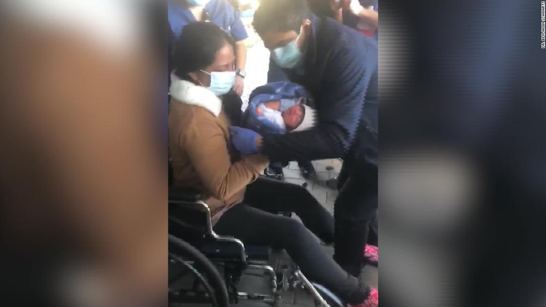 See mom reunite with newborn after battle with Covid-19