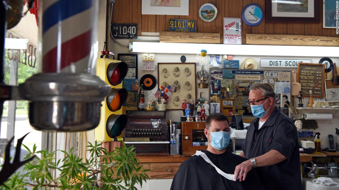 Texas governor reopens more businesses and schools days after highest jump in Covid-19 cases in the state