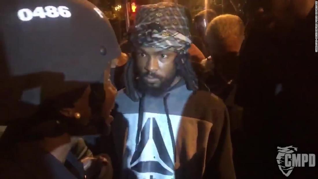 Charlotte cop meets protesters on front line with dialogue