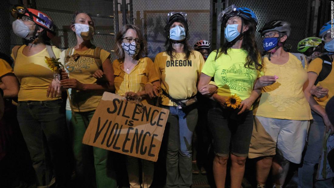 Moms try to protect protestors in Portland, Oregon