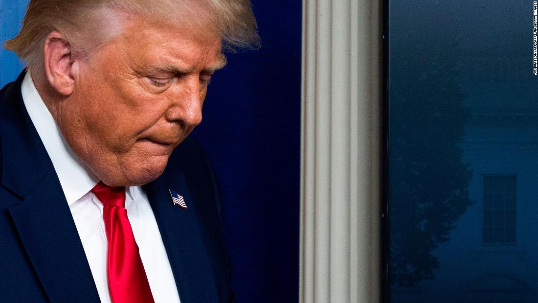 Video resurfaces of Trump struggling to vote in person in 2004 as he ramps up attacks on mail-in voting