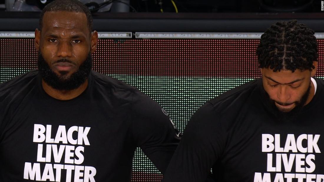 See LeBron James and all NBA players kneel during National Anthem